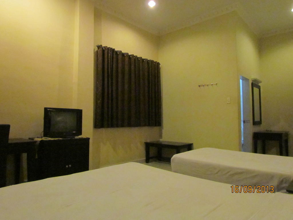 Carolina Transit Hotel Medan Room photo